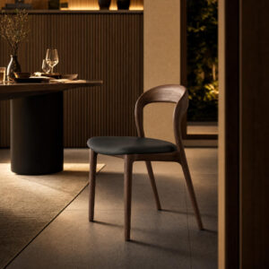 Contemporary Walnut Armless Dining Chair in Black, styled campaign view