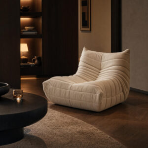 Caterpillar Pleated Lounge Chair in Cream, styled campaign view