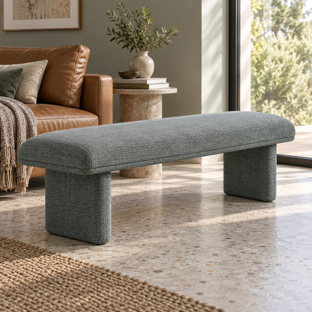 Liora Upholstered Bedroom Bench in green, in a furnished interior