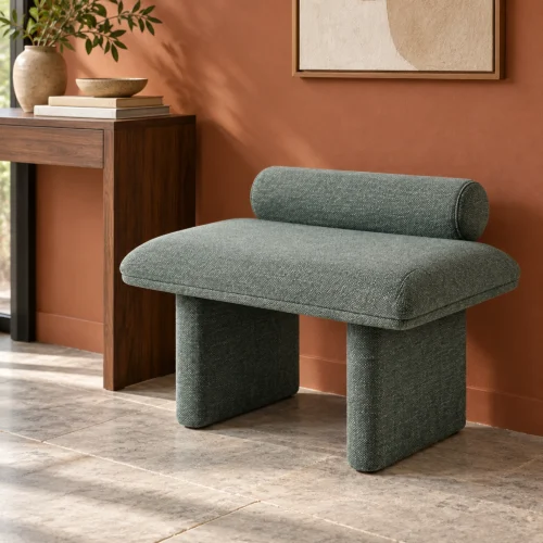 Corwin Upholstered Bedroom Bench in green, in a furnished interior