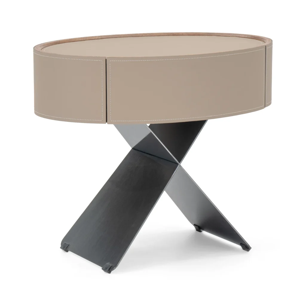 Lune oval bedside table in light taupe with one curved-front drawer and crossed metal base, front view on white