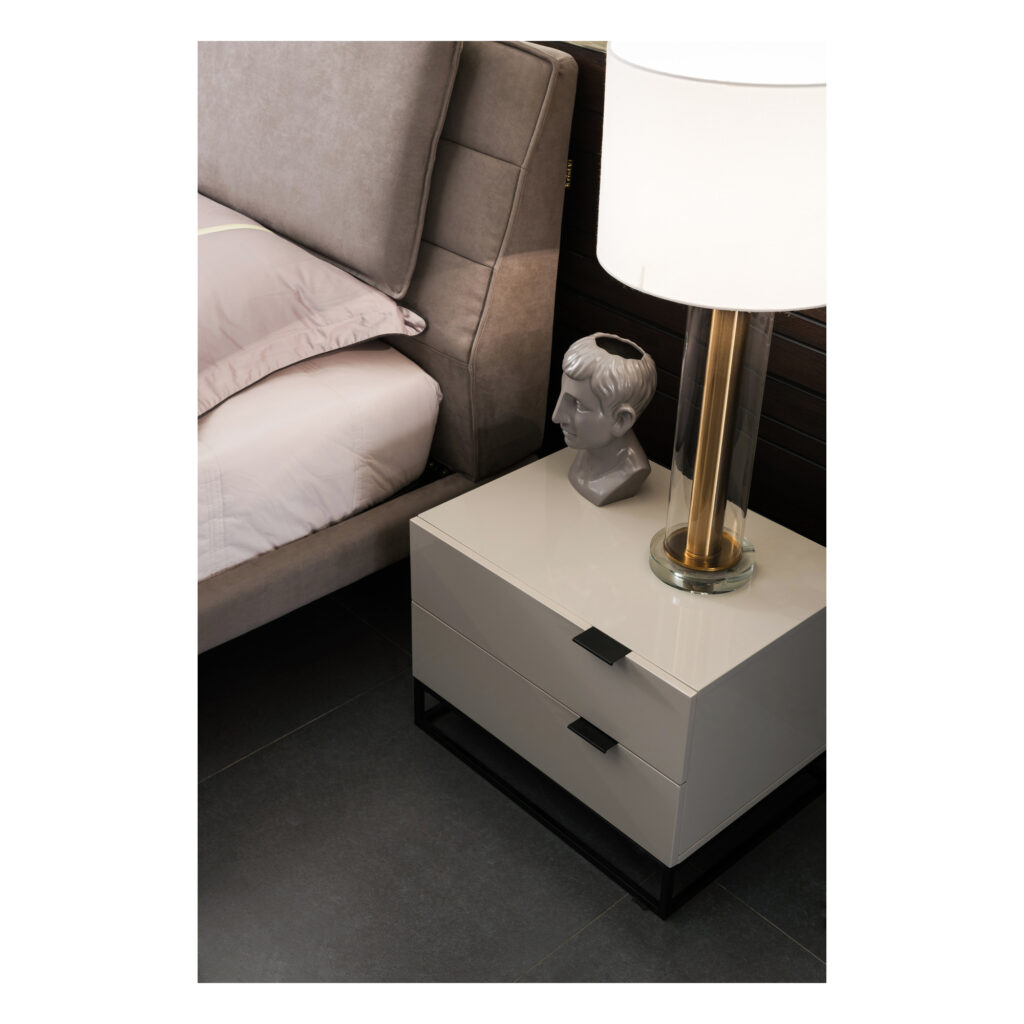Noren Grey Two-Drawer Bedside Table with Black Metal Base — supplier bedside room view showing the top and drawers