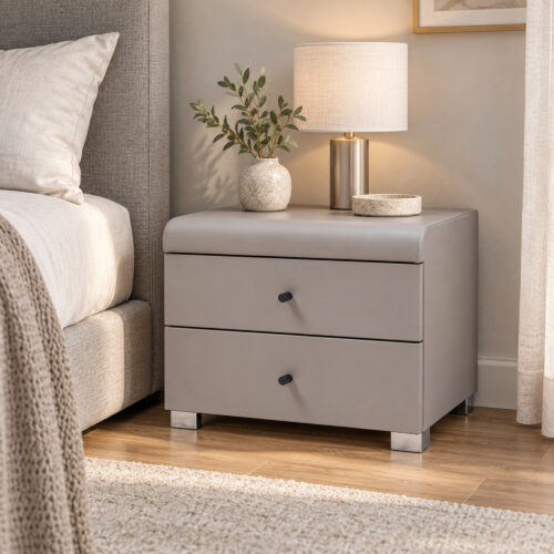 Cove Grey Two-Drawer Bedside Table — closer bedside view showing drawer fronts and base