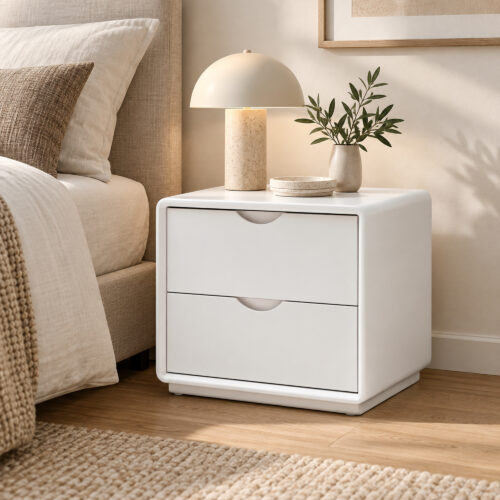 Arc White Two-Drawer Bedside Table with Recessed Pulls — closer bedside view showing drawer fronts and base