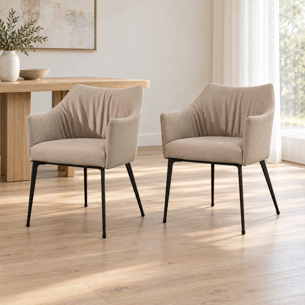 Harrow Dining Chair Set — two matching taupe chairs, front view in a bright oak dining room. Other furnishings are staging only.