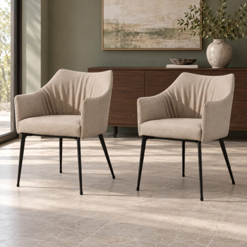 Harrow Dining Chair Set — two matching taupe chairs, three-quarter view beside a sage wall and walnut sideboard. Other furnishings are staging only.