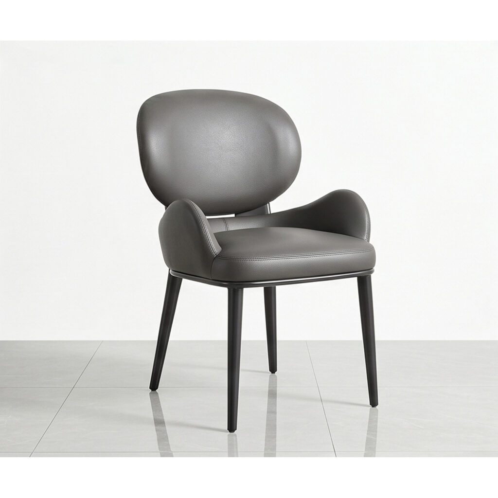 Supplier three-quarter photograph of one dark grey Huxley dining chair; listing includes two chairs.