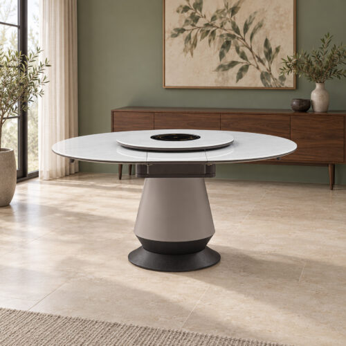 White Rotating-Leaf Extendable Dining Table in a sage-accented dining space; room furnishings are staging only and are not included.