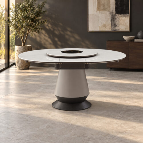 White Rotating-Leaf Extendable Dining Table in a charcoal-accented modern dining room; room furnishings are staging only and are not included.