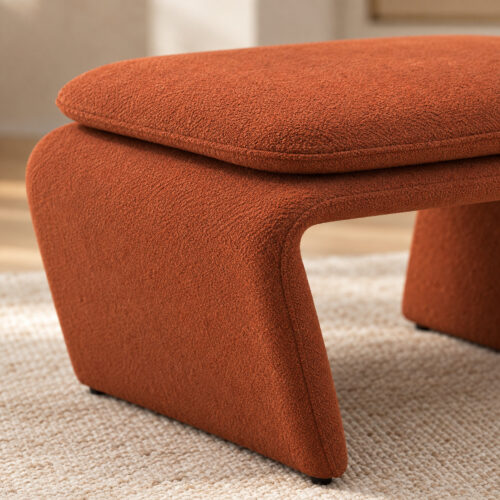 Rylan Camel Fabric Footstool with Curved Upholstered Supports — close detail of cushion and curved support