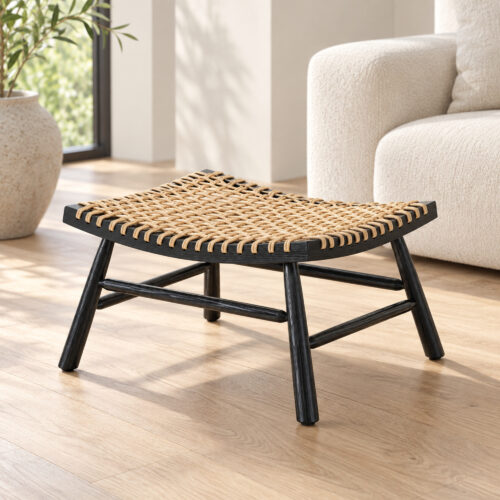 Marlow Black Ash-Wood and Natural-Tone PE Rattan Footstool — low view in a light lounge