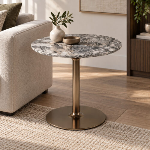 Grey Swirl Sintered Stone Pedestal Side Table — closer view beside an armchair on a textured rug